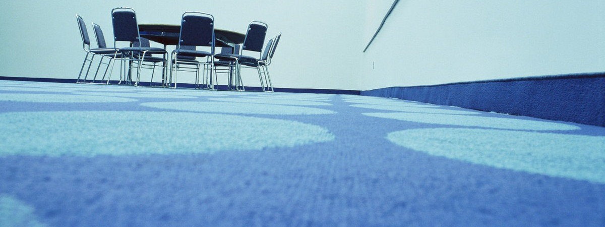 Deep cleaned office carpet with meeting room office and chairs. Warrington.